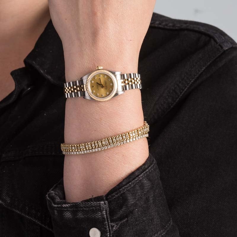 Ladies Rolex Oyster Perpetual 76193 Champagne Diamond Dial
